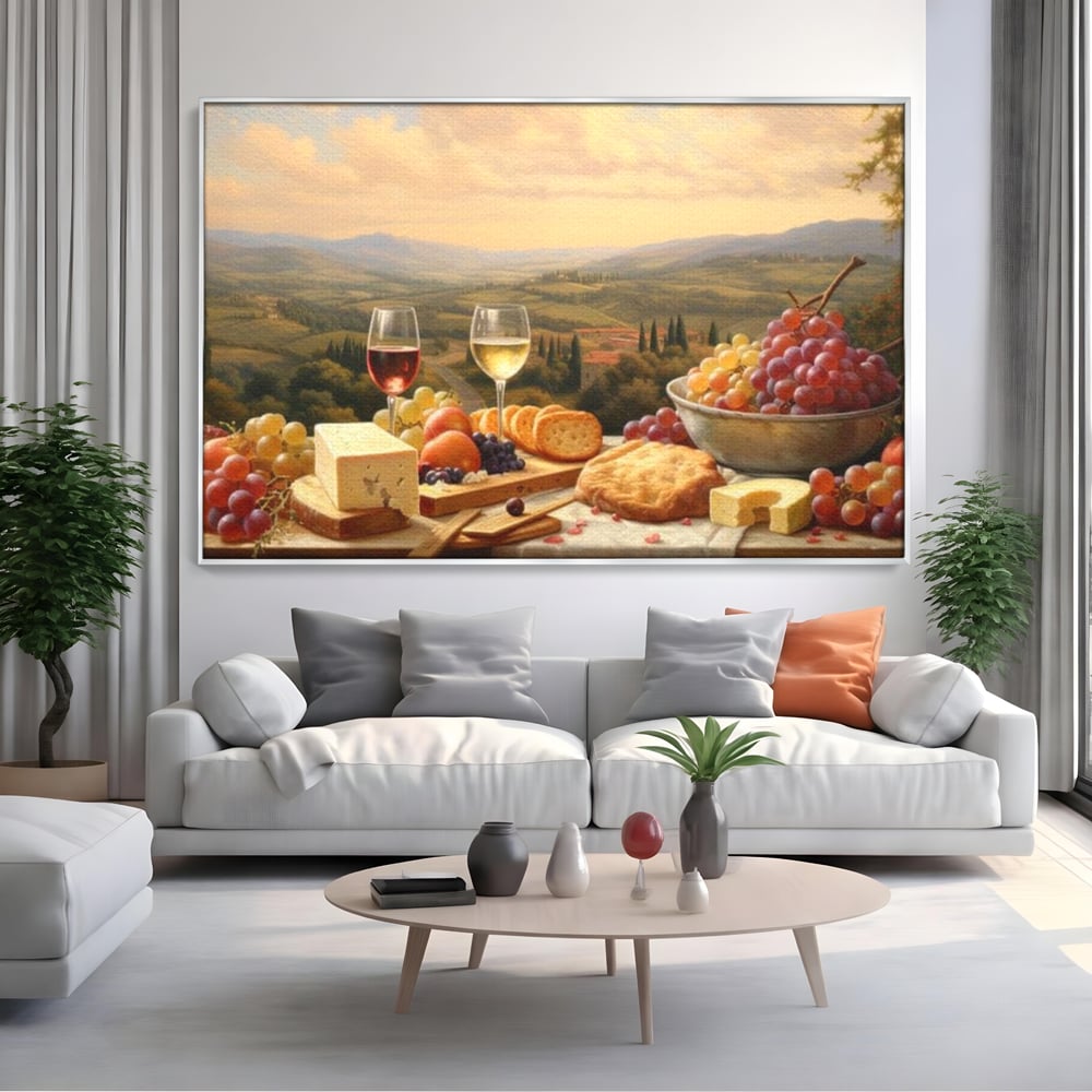 Tablou canvas cu tablou canvas cu peisaj tomnatic si masa imbelsugata, in rama de aluminiu argintiu, pe perete intr-un living